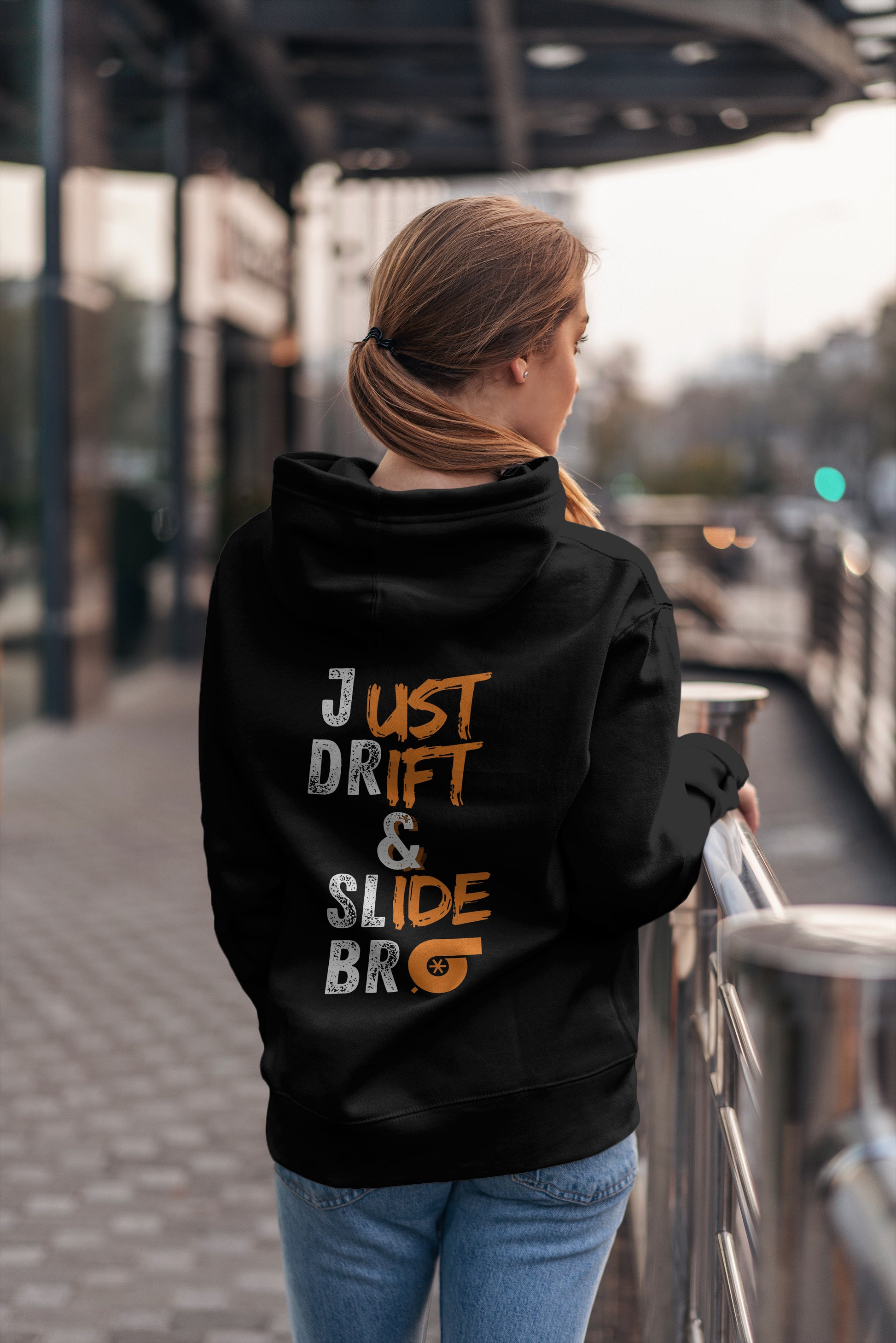 Model wearing a drift it hoodie , standing in Brisbane city